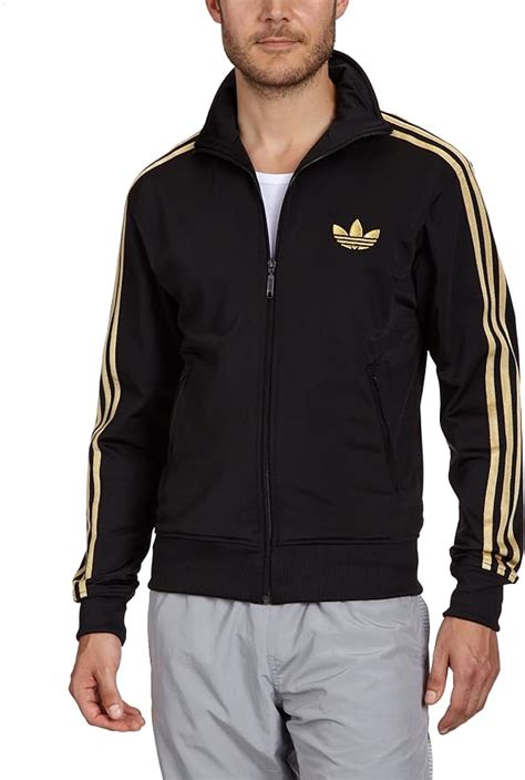 adidas firebird herren schwarz gold|adidas firebird track shirt.